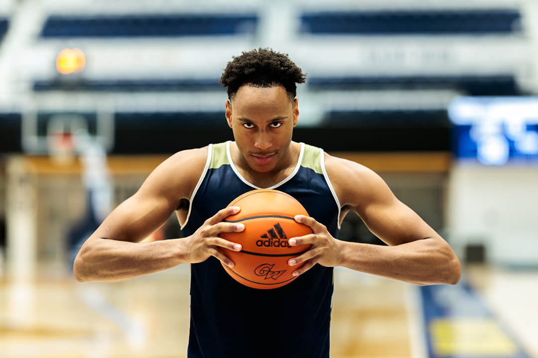 Rafael Castro holding a basketball