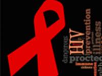 red ribbon with part of an HIV-related word cloud