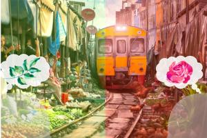 a train going through an alley of houses and shops